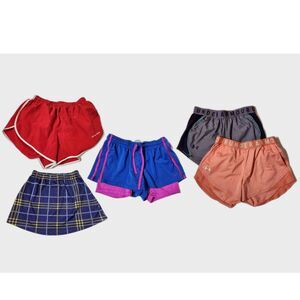 Women’s Size Small Clothing Lot – 1 Skirt + 4 Athletic Shorts